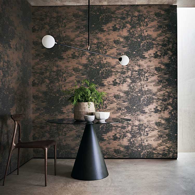 Designer bronze pattern wall paper from Romo creates a dramatic effect in this luxury interior
