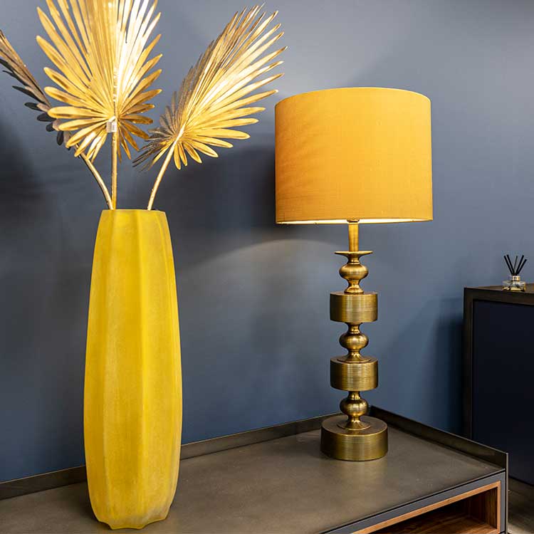 Designer antique bronze table lamp with bespoke yellow lampshade