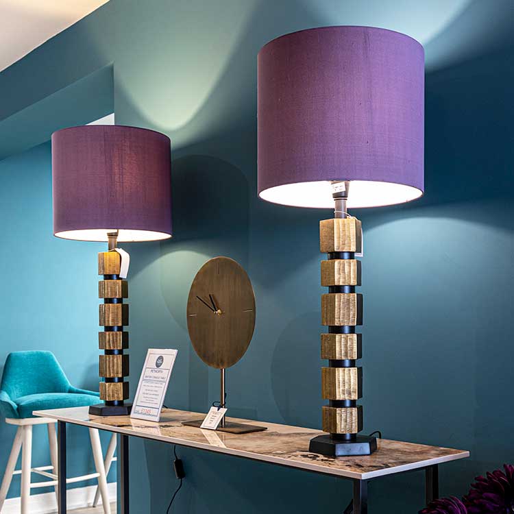 Bronze table lamps with rich purple lampshades at New England Home Interiors