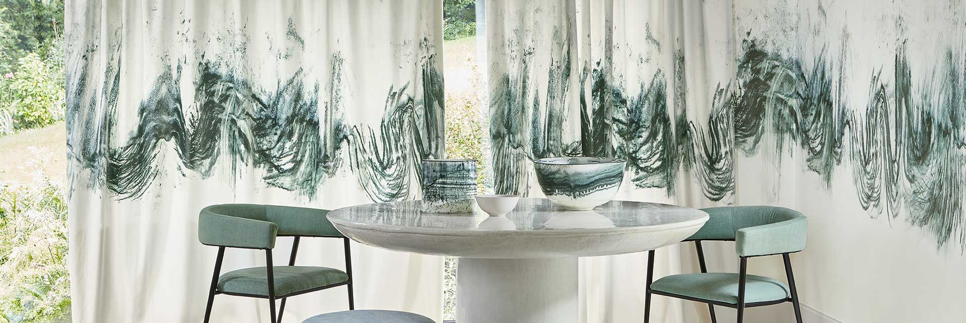 Matched luxury fabrics and wallpaper from Romo
