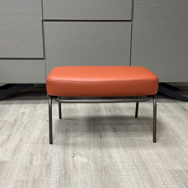 Tibbe industrial look footstool in Mandarin colour leather with aged bronze frame