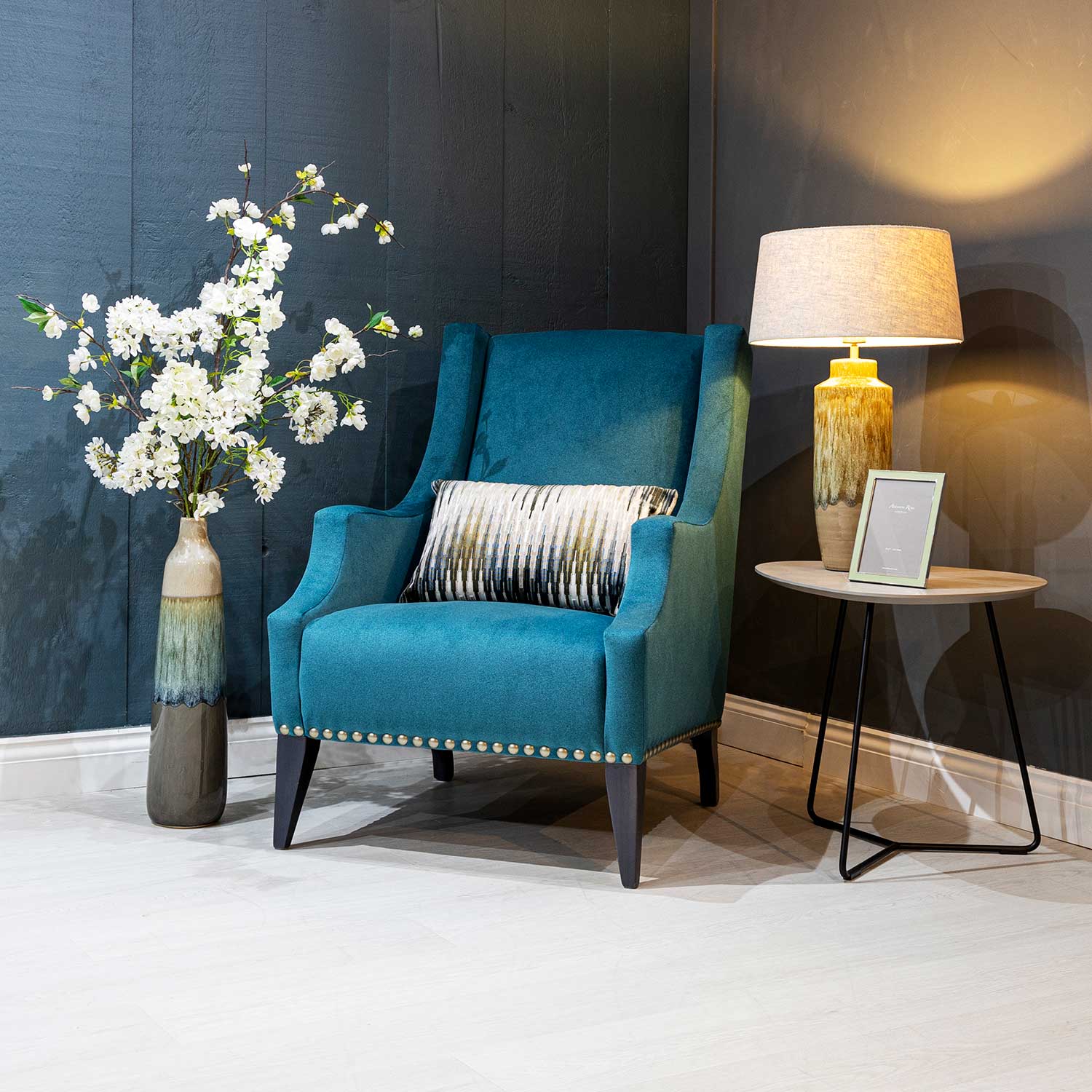 Linden slim armchair in blue velvet on display at New England Home Interiors
