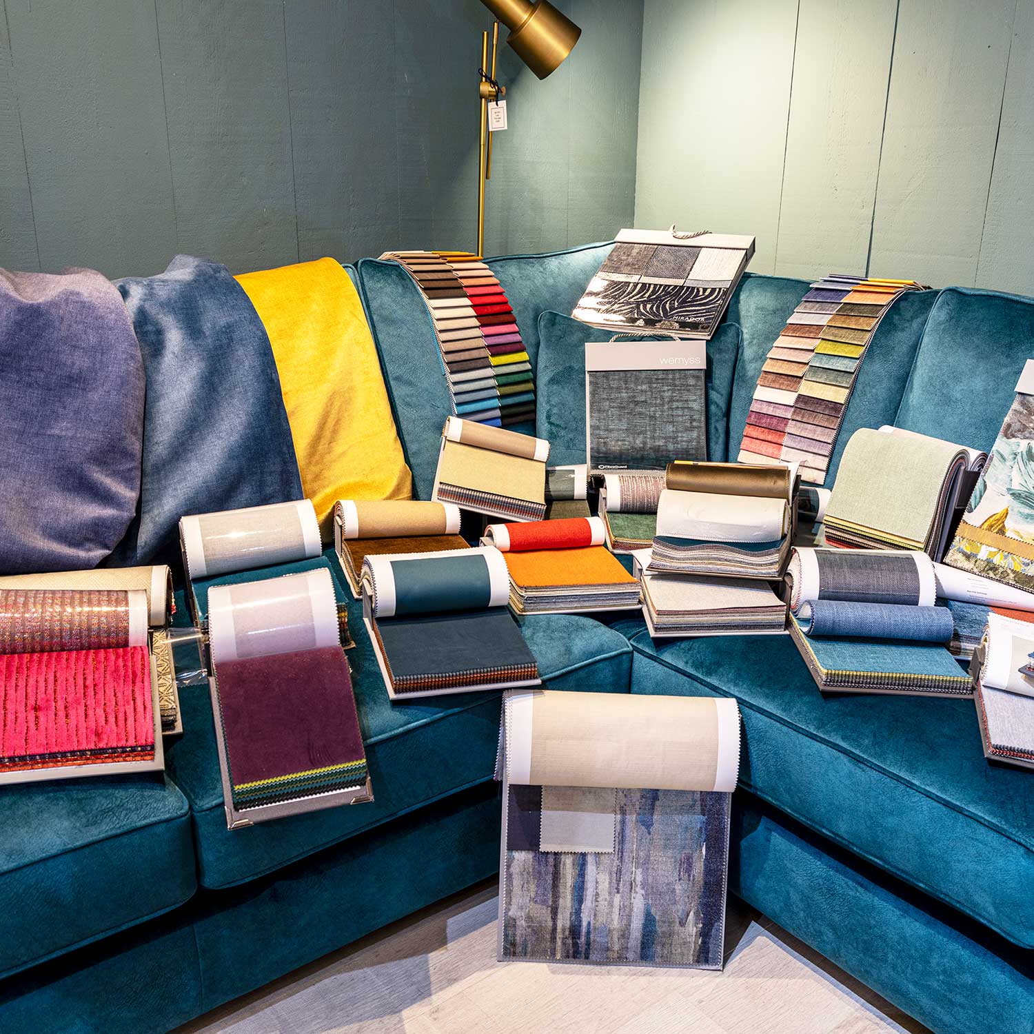 Huge range of sofa fabrics displayed at New England Home Interiors sofa shop in Horsham