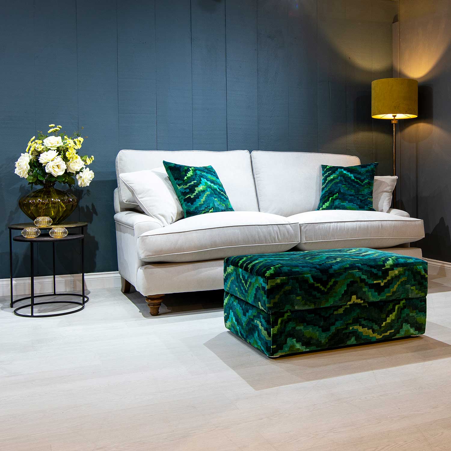 White Winchester 2 seater sofa with contrasting bespoke green cushions and Ottoman footstool