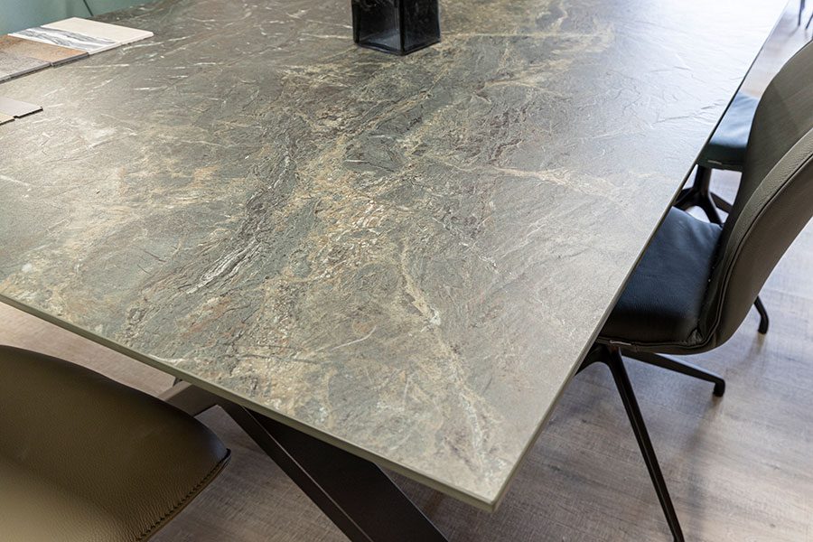 Sintered stone dining tables feature a top that is beautiful but practically indestructible