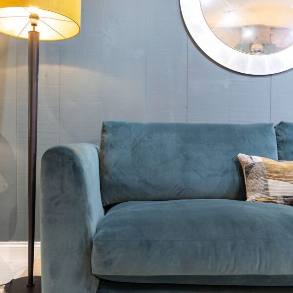Hampton bespoke sofa with slim rounded top arms covered in teal velvet