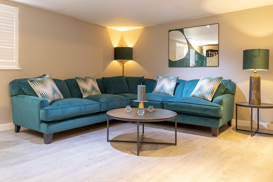 Large Austin ex-display corner sofa in Kingfisher blue luxury velvet