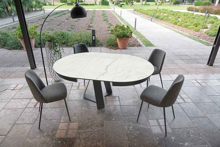 Cleveland round extending dining table with marble effect Dekton stone top