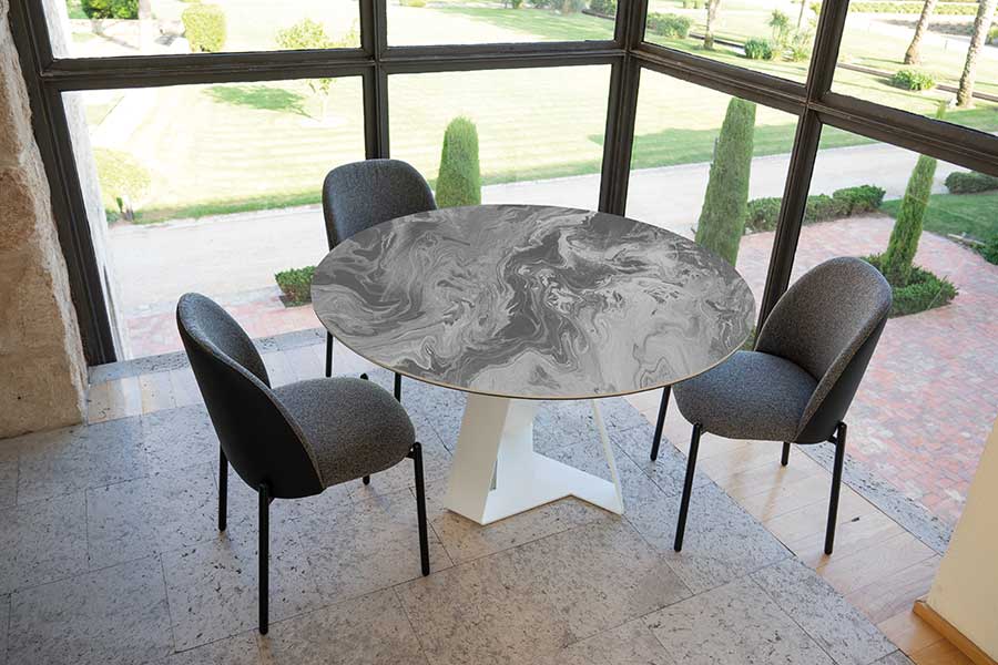 Cleveland round dining table with grey black marble effect Dekton top