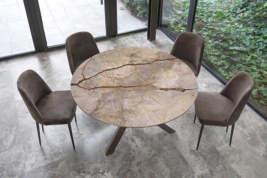 Memphis round Dekton dining table with marble effect sintered stone top