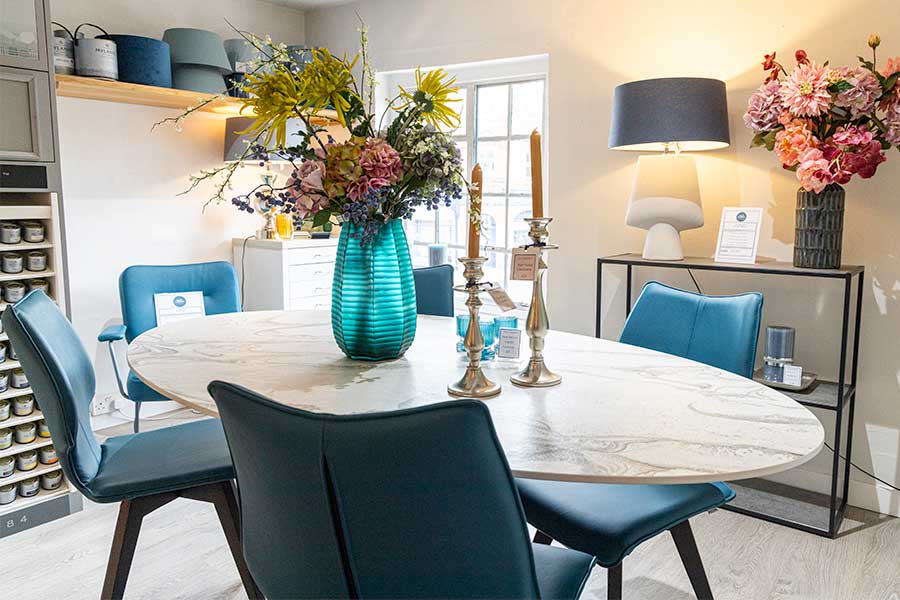 Ex-display Cleveland oval dining table with Liquid Sky white marble effect Dekton top at New England Home Interiors