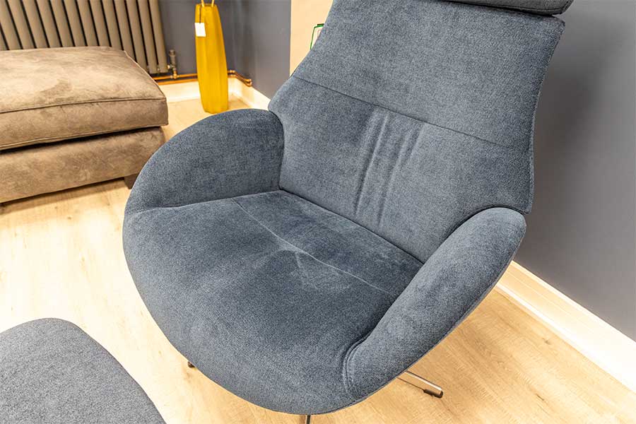 Globe swivel armchair upholstered in luxury AquaClean blue fabric