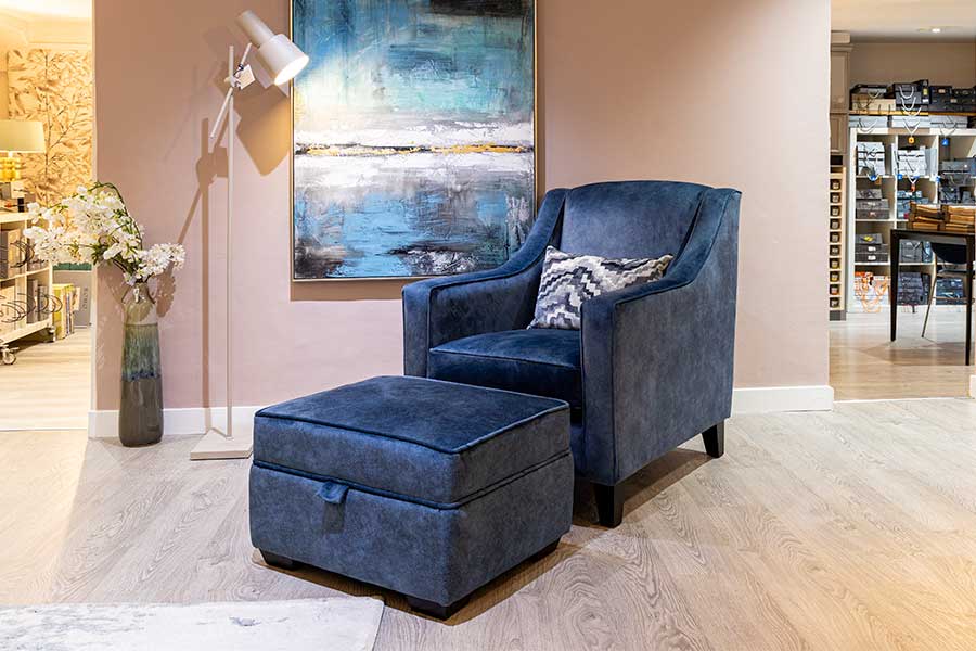 Blue velvet Hatton Fixed Back bespoke armchair with matching footstool